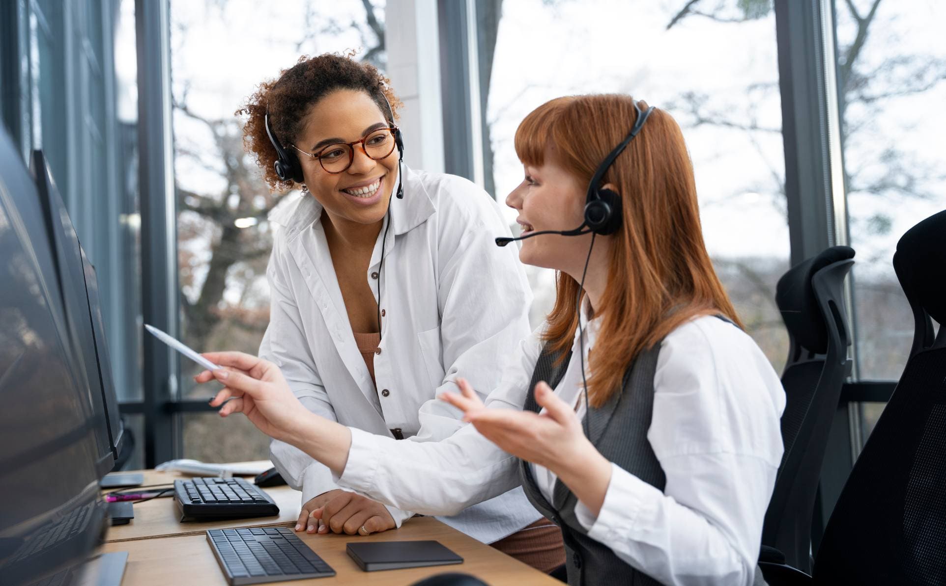 Admissions department team collaborating in an office setting.