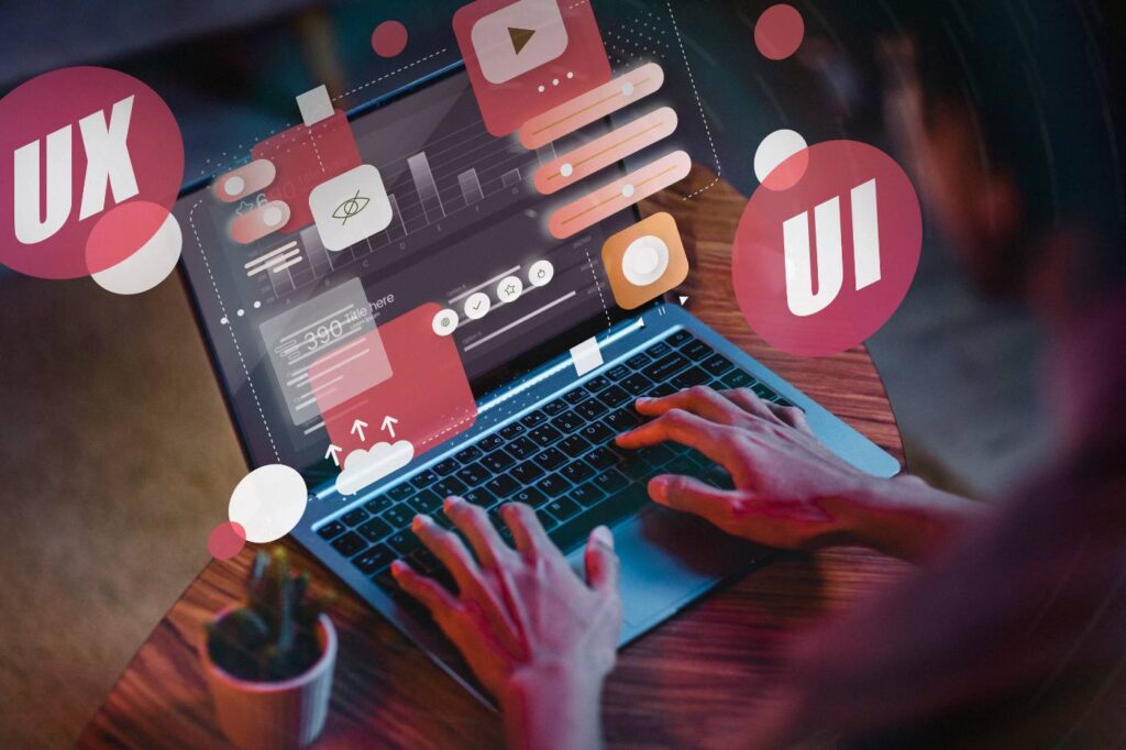 Person improving website layout and functionality during website design project.