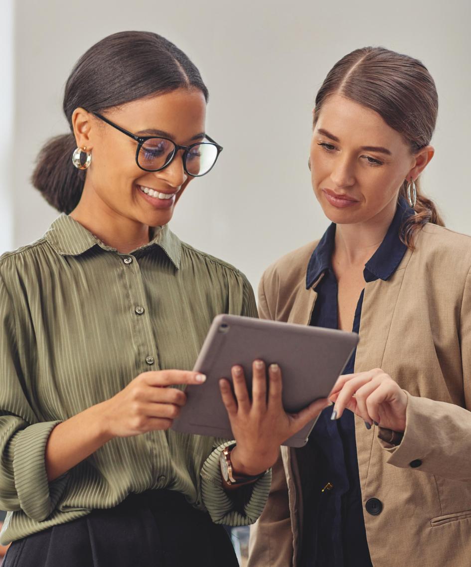 Colleagues reviewing non profit behavioral health marketing results.