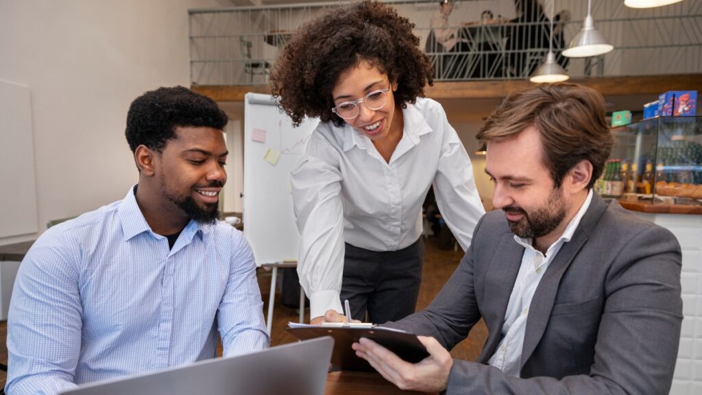 A team meeting to discuss strategies for online reputation management services.