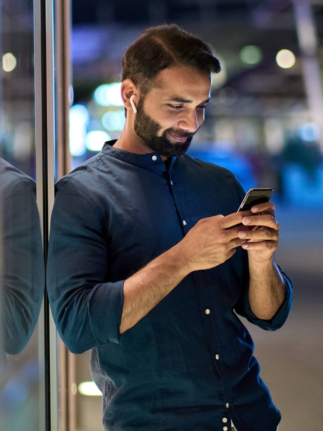 A man researches PPC management services.