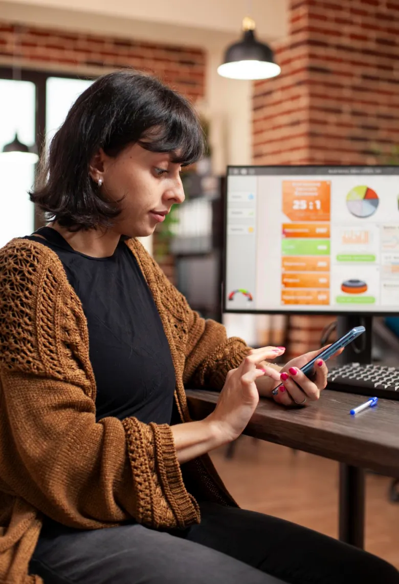 Woman reviewing digital marketing performance.