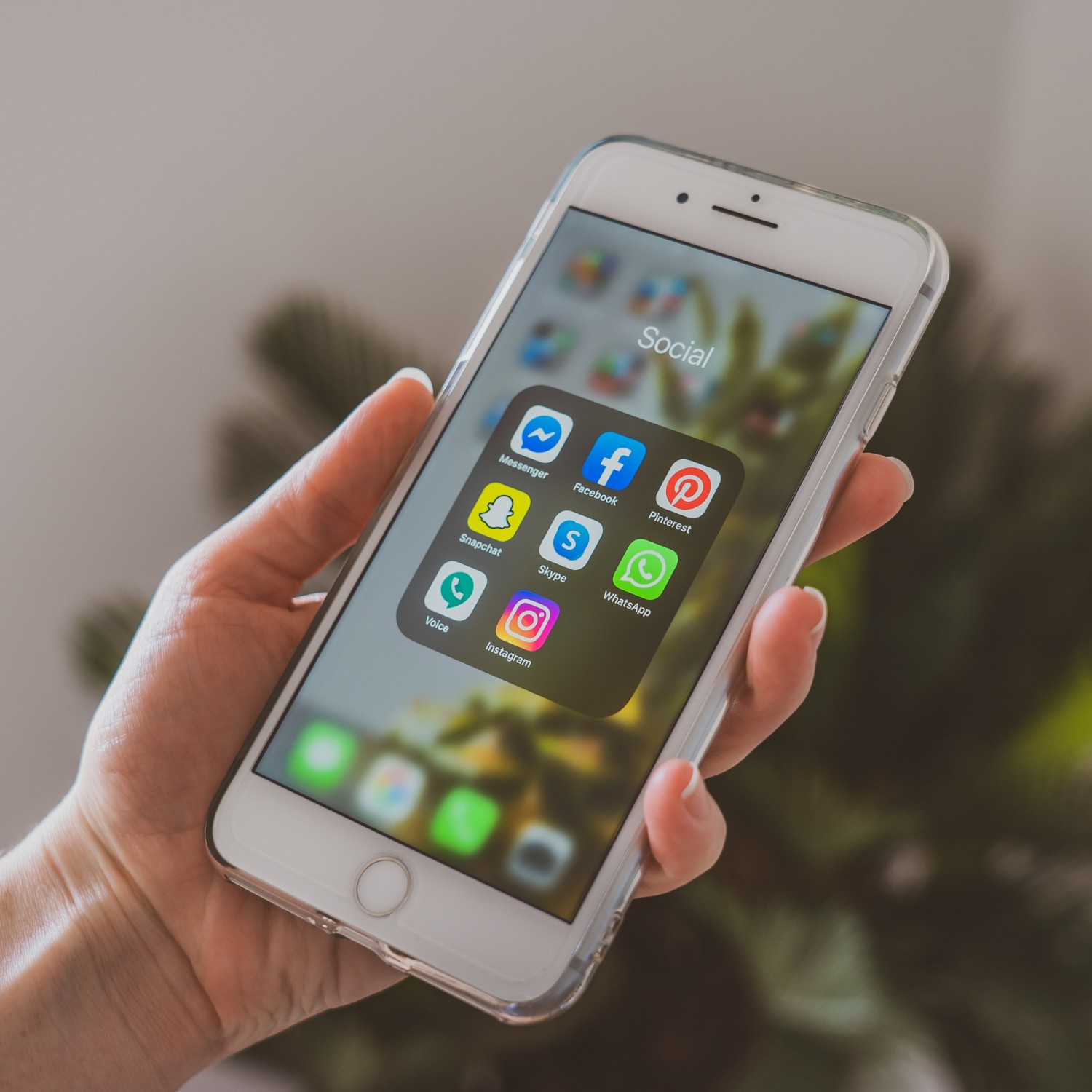 Individual managing social media marketing tasks.